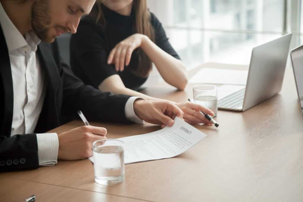 Man Signing Sales Contract